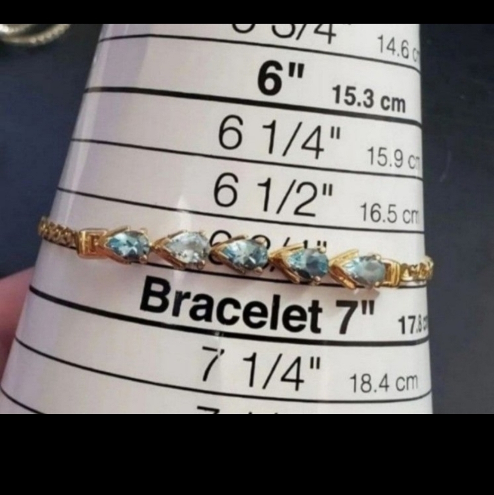 14k yellow gold blue topaz bracelet! This will fit up to about 6 3/4 inch wrist. - Picture 2 of 6